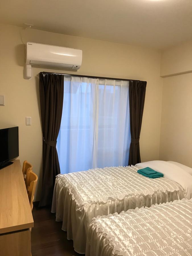 Weekly Harbourview Mansion Ginowan Apartment Bagian luar foto